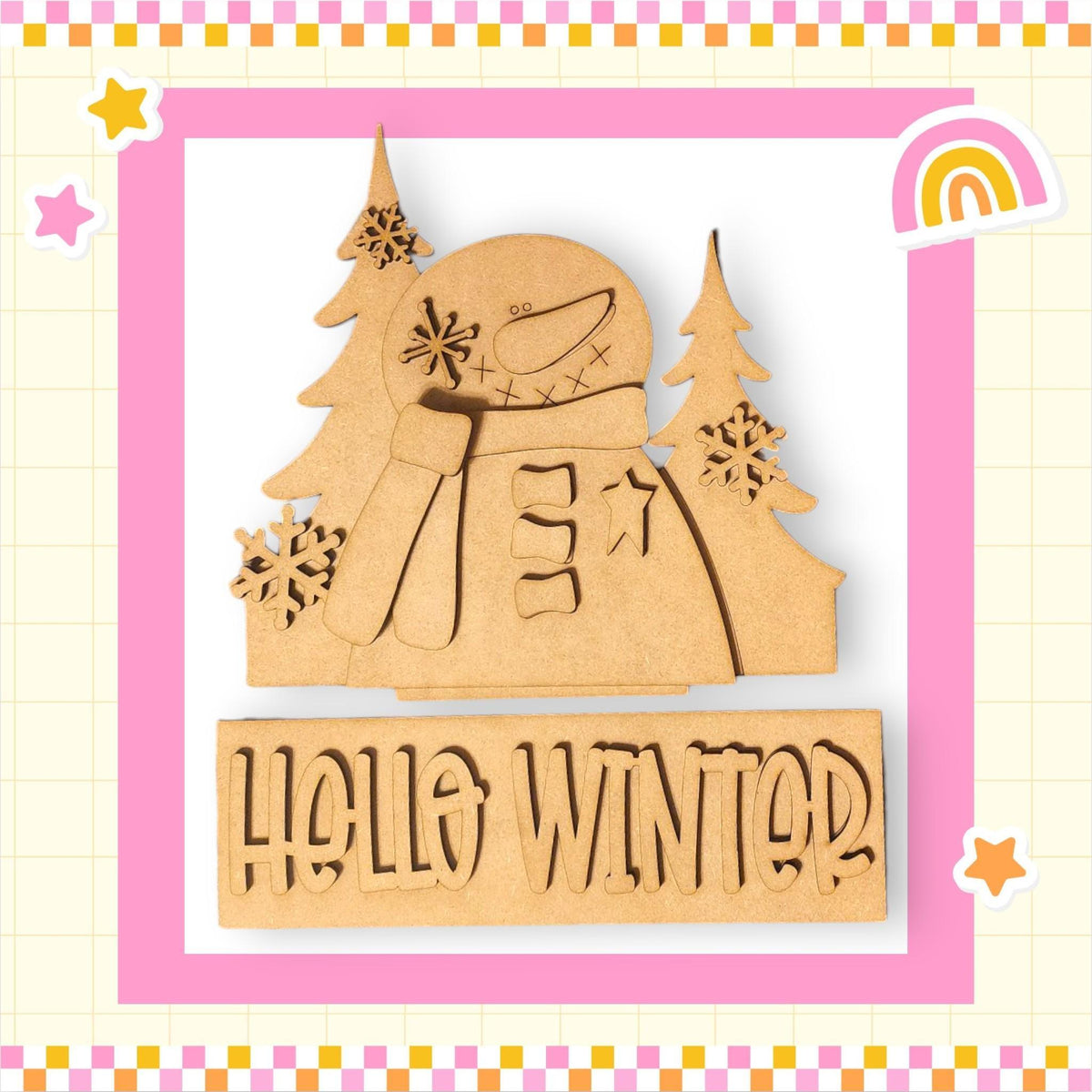 a wooden cutout of a snowman with a rainbow in the background