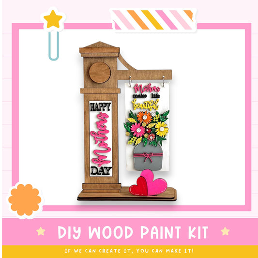 a diy wood paint kit with flowers and hearts