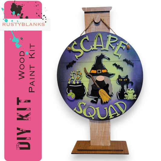 a wooden sign that says scare squad on it