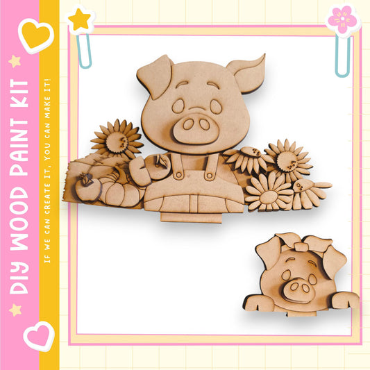 a wooden paint kit with a pig and flowers, along with a heart and a star.