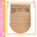 a wooden sign with the text "HOME SWEET HOME" carved into it.