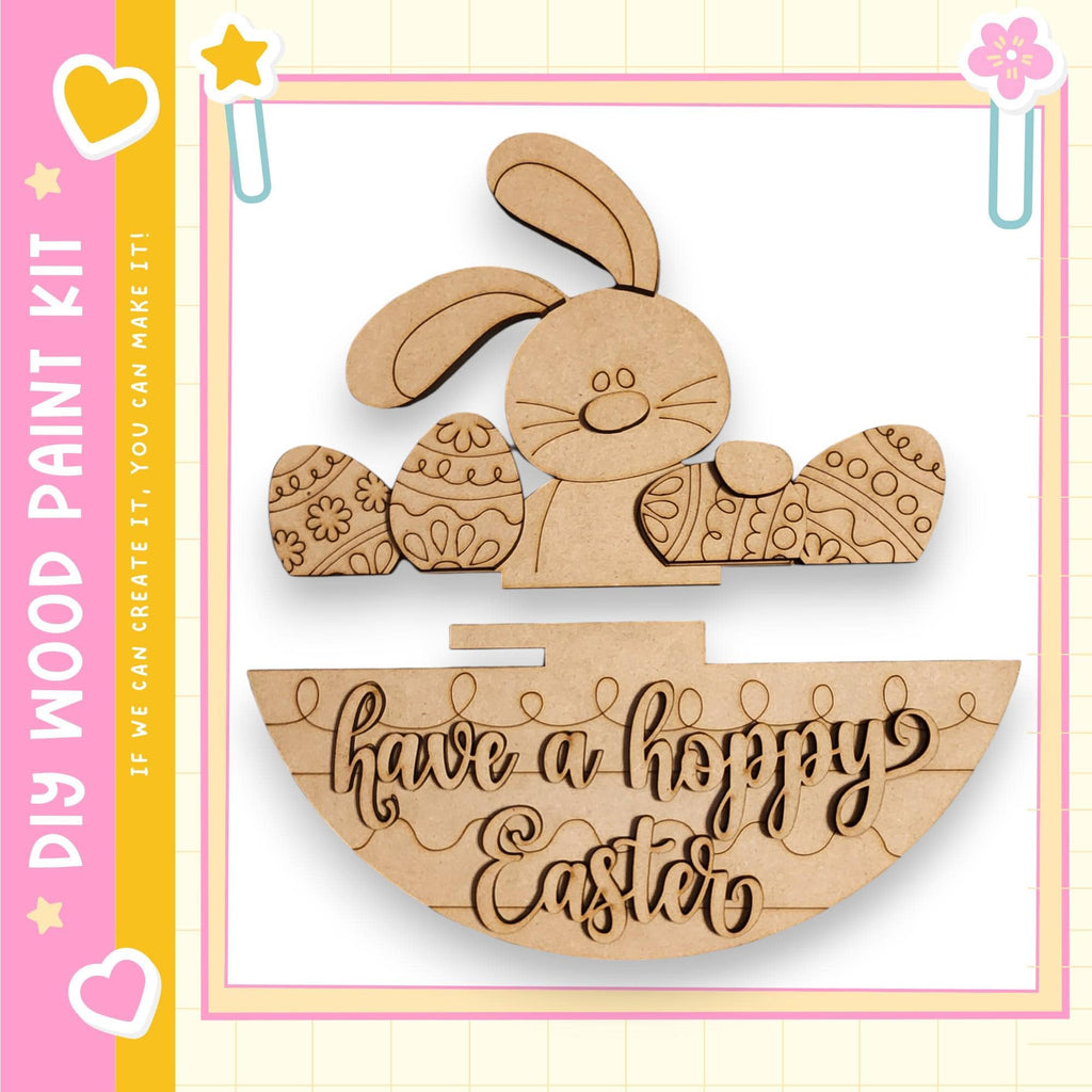 a wooden Easter decoration kit with a bunny and decorated Easter eggs. The kit includes a sign that says "Have a happy Easter".