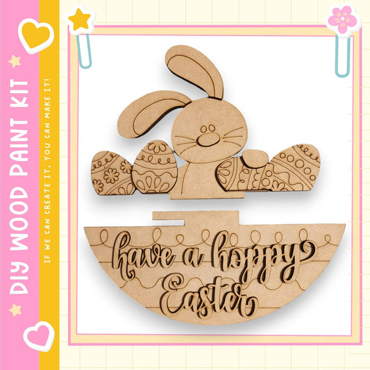 a wooden Easter decoration kit with a bunny and decorated Easter eggs. The kit includes a sign that says "Have a happy Easter".
