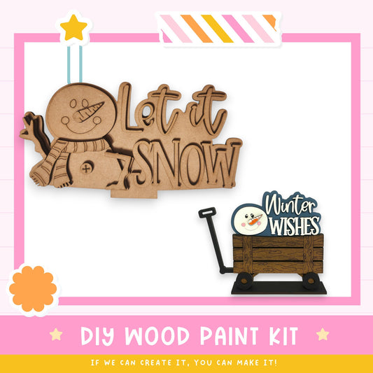 a DIY wood paint kit for creating winter-themed decorations, including a wooden snowman and a wooden wagon.