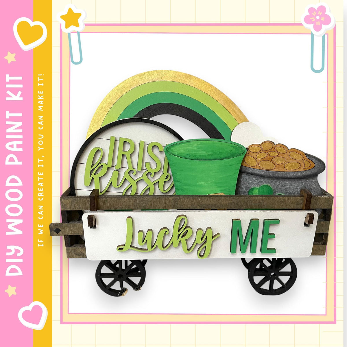 a wooden wagon with a pot of gold coins on top, along with a sign that says "Lucky Me".