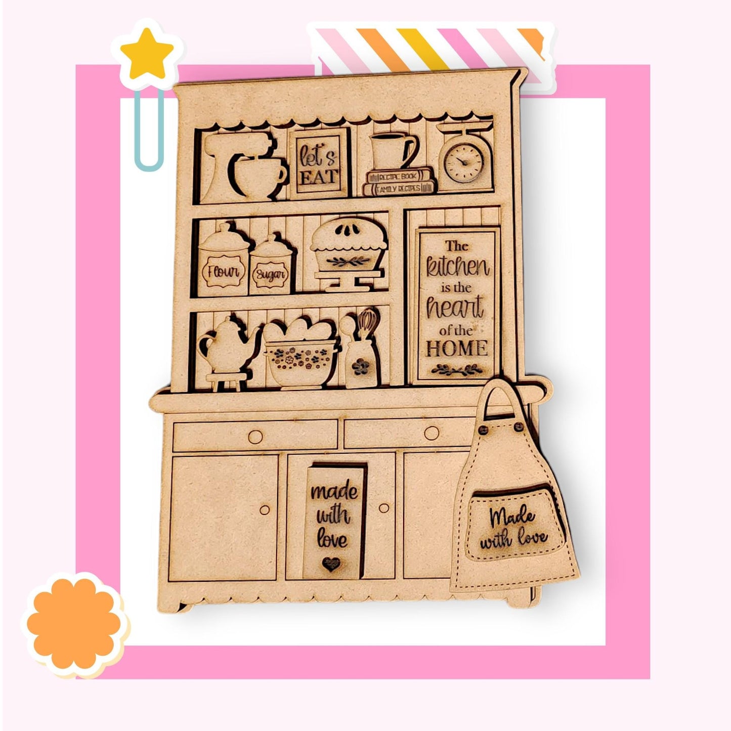 a picture of a wooden cutout of a kitchen