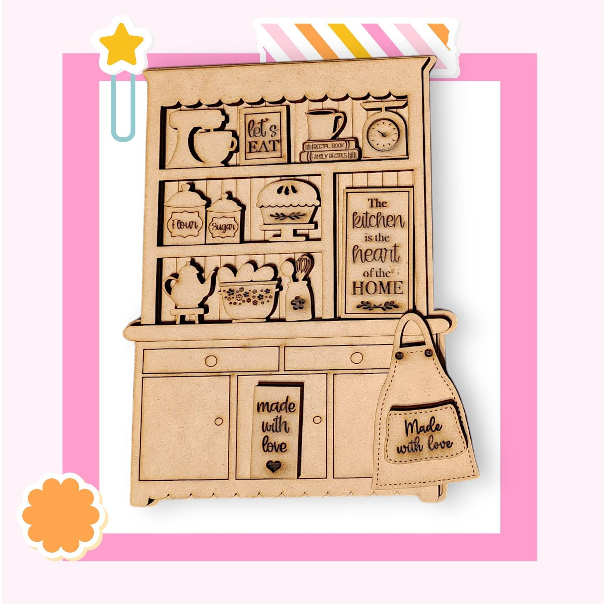 a picture of a wooden cutout of a kitchen