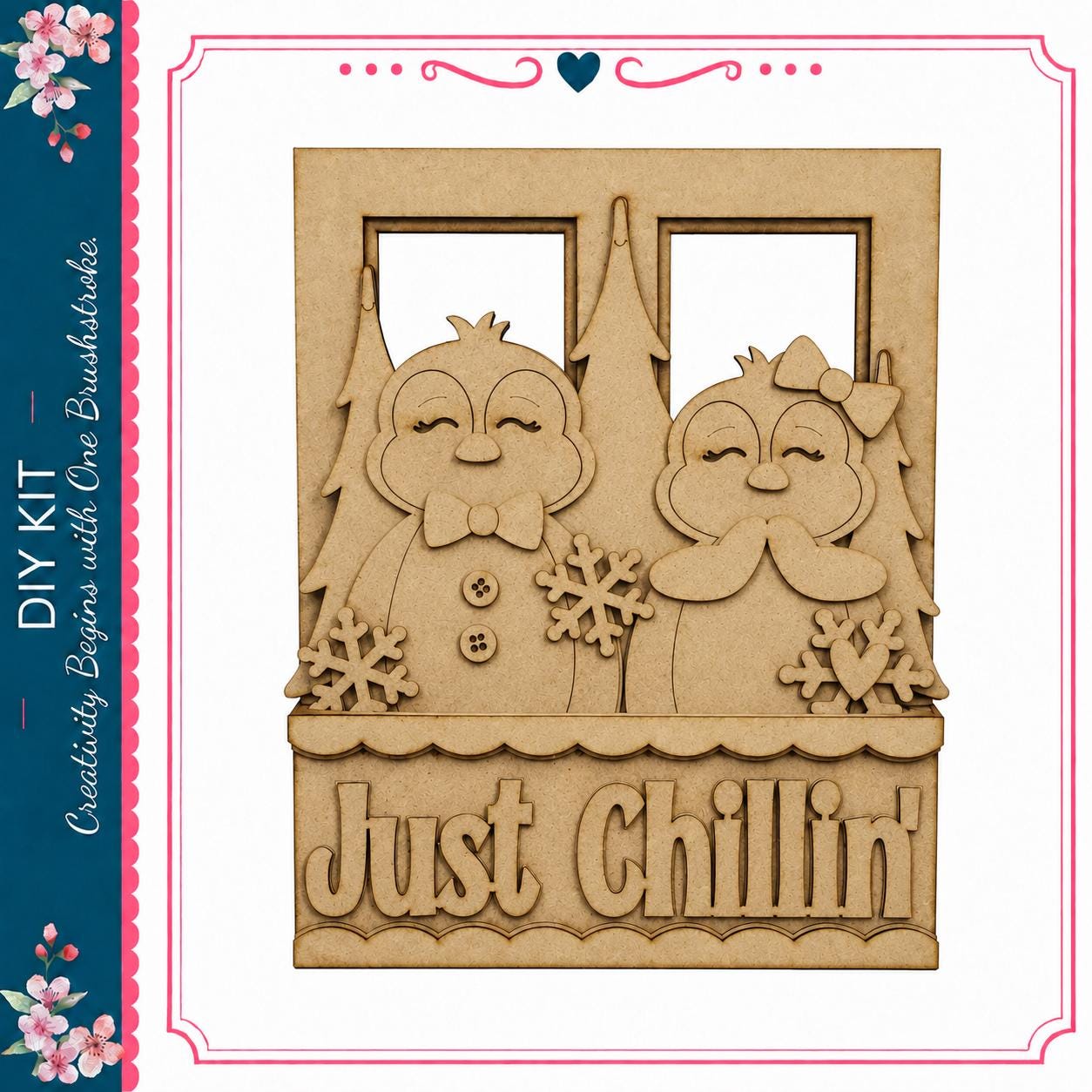 A wooden frame with two cartoon penguins and snowflakes, along with the text "Just Chilling" on it.