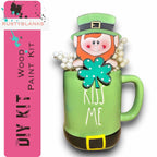 a st patrick's day mug with a lepreite in it