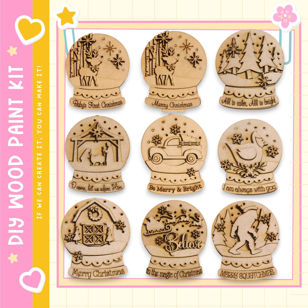 nine wooden snow globe ornaments with various holiday-themed designs, including animals, vehicles, and people.