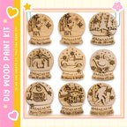 nine wooden snow globe ornaments with various holiday-themed designs, including animals, vehicles, and people.