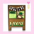 there is a picture of a moose on the wall