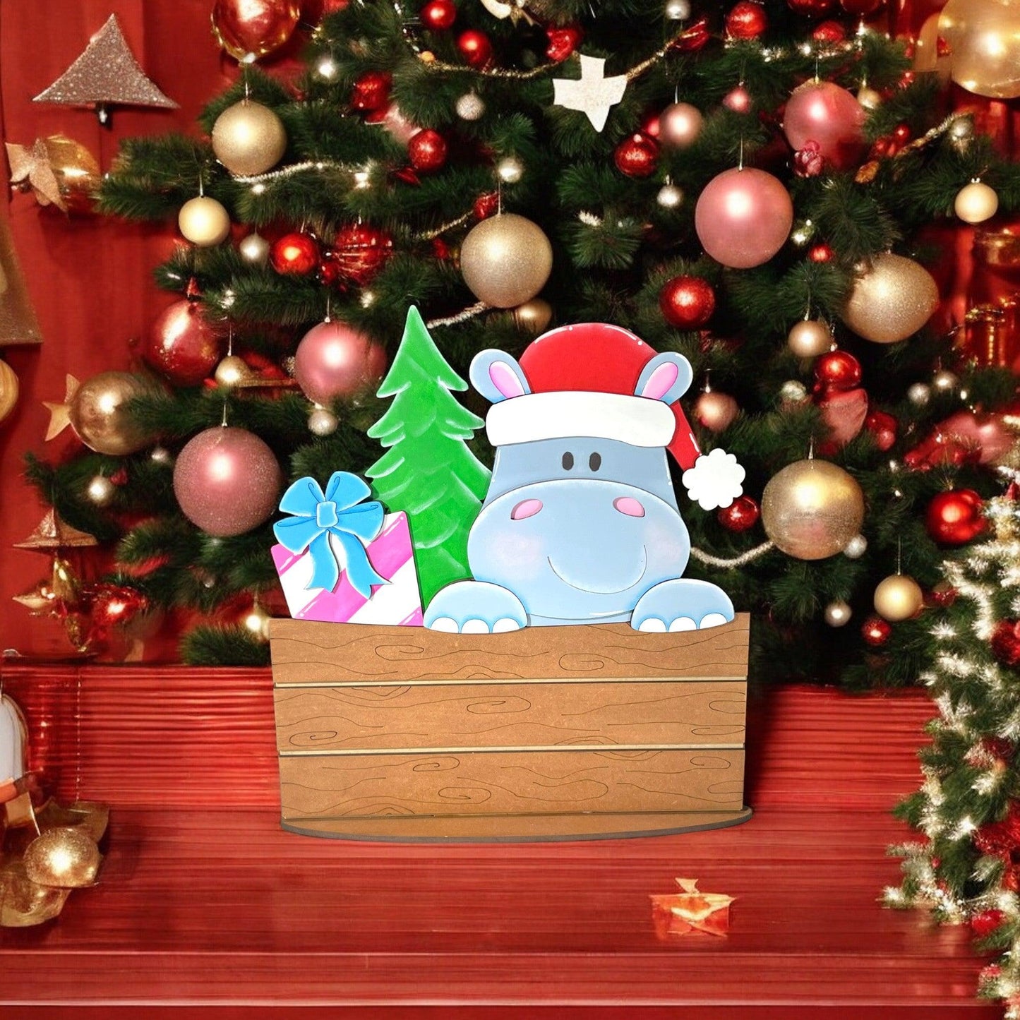 a christmas tree with a hippo in a box