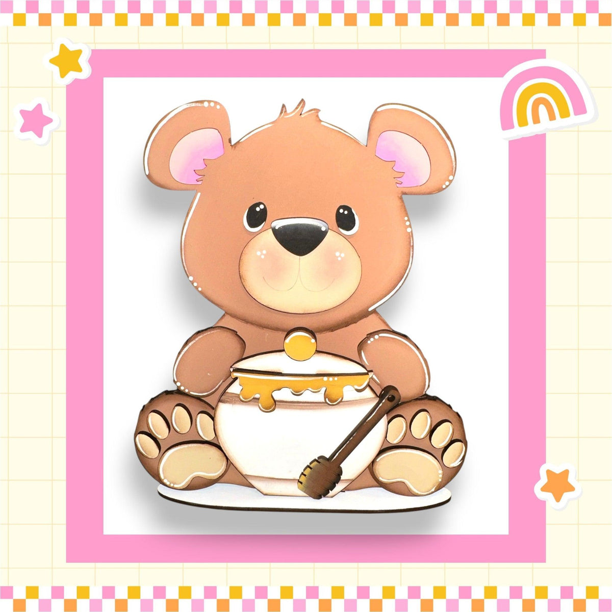 a brown teddy bear sitting on top of a bowl