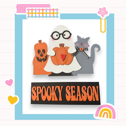A spooky scene featuring a ghost, a cat, and a pumpkin, with the text "SPOKEY SEASON" displayed below.