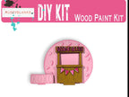 a picture of a pink wooden paint kit