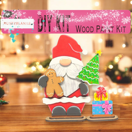 a wooden craft kit with a santa clause and a gingerbread