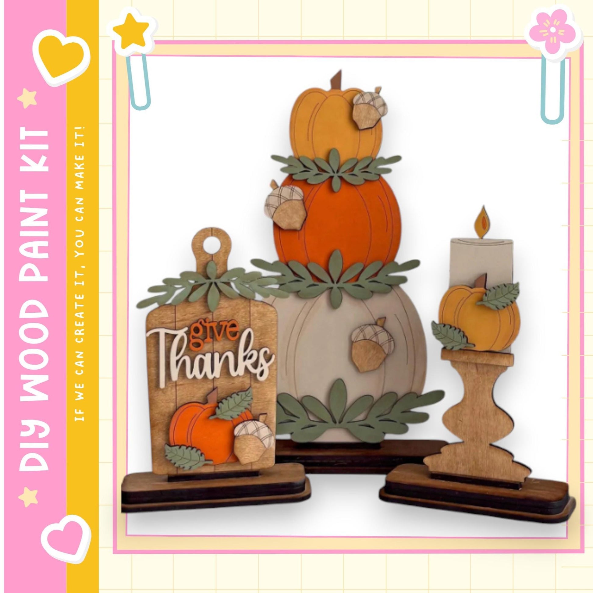 A wooden paint kit featuring a carved pumpkin and a candle, with the words "Give Thanks" written on the pumpkin.