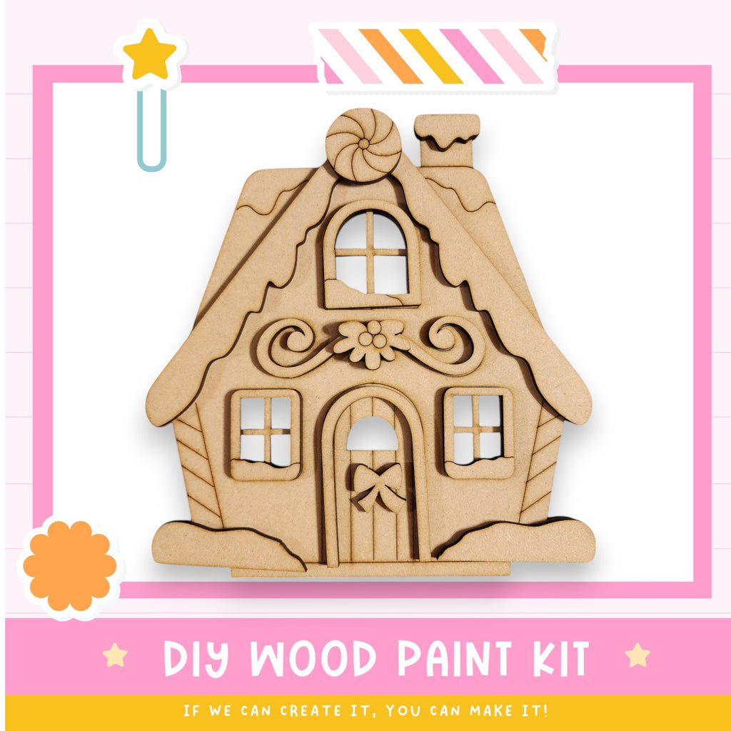 a wooden craft kit with a picture of a house
