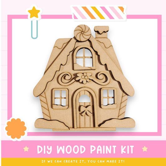 a wooden craft kit with a picture of a house