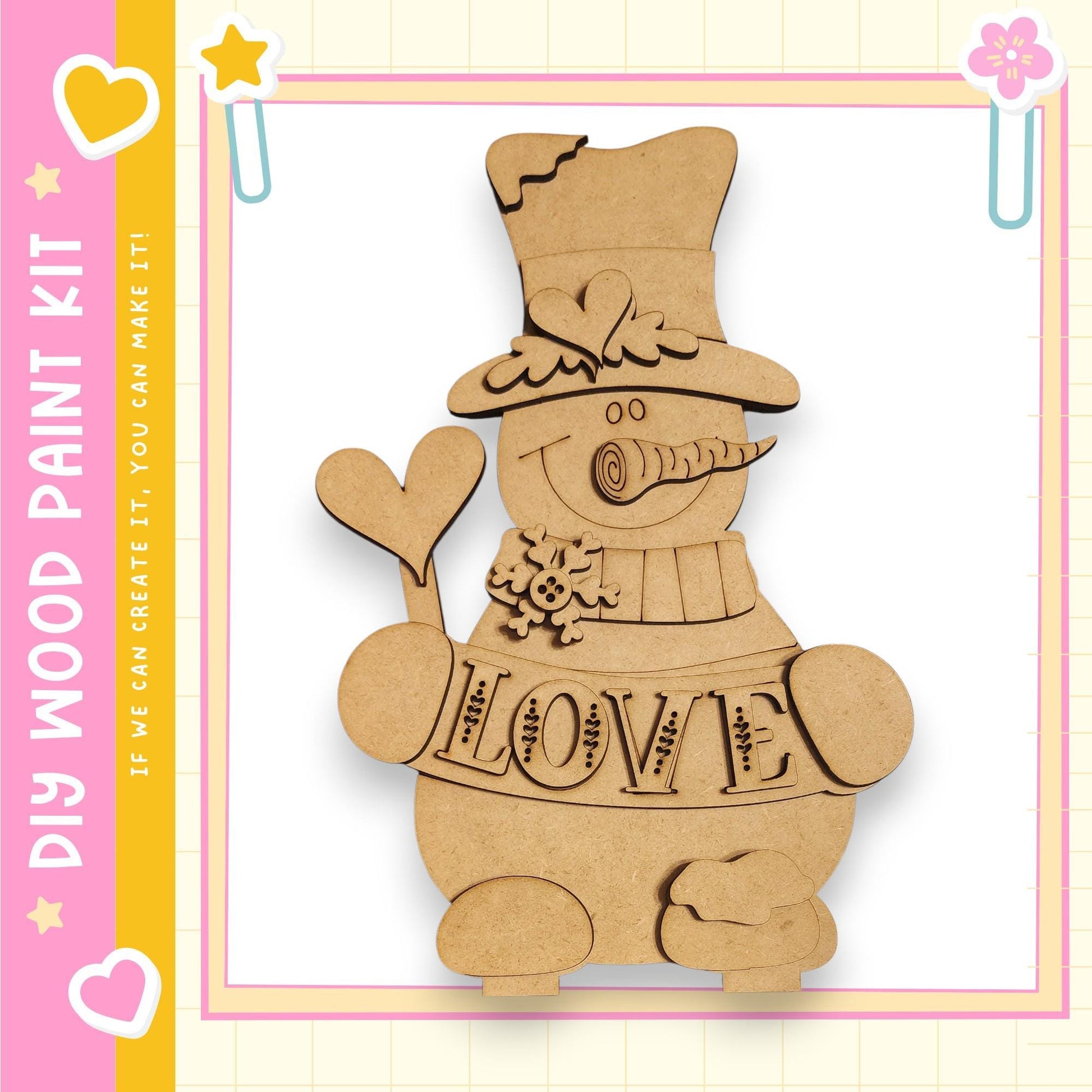 A wooden snowman kit with the word "LOVE" written on it, along with a heart and star decoration.