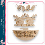 a DIY kit with a Christmas-themed decoration, including a pair of wooden reindeer, a wooden sign, and a wooden bow.