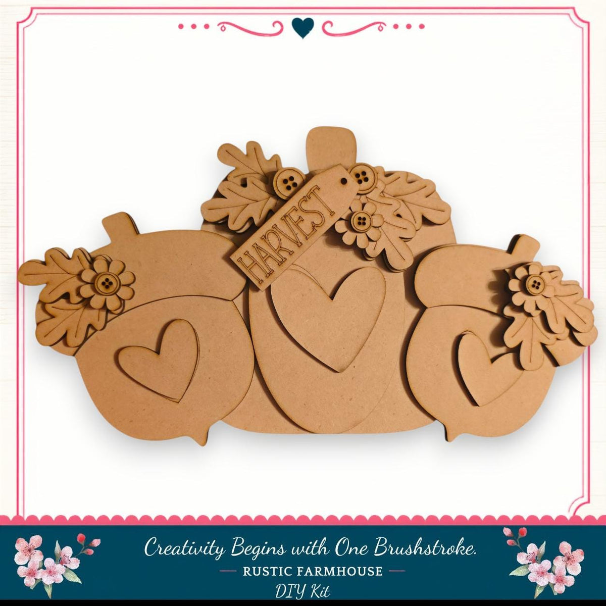A wooden pumpkin decoration with hearts and leaves, featuring the word "Harvest" on it. The pumpkin is part of a larger wooden decoration set, and the image is described as a DIY kit from a rustic farmhouse.