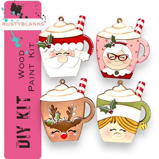 a set of four christmas themed tea cups