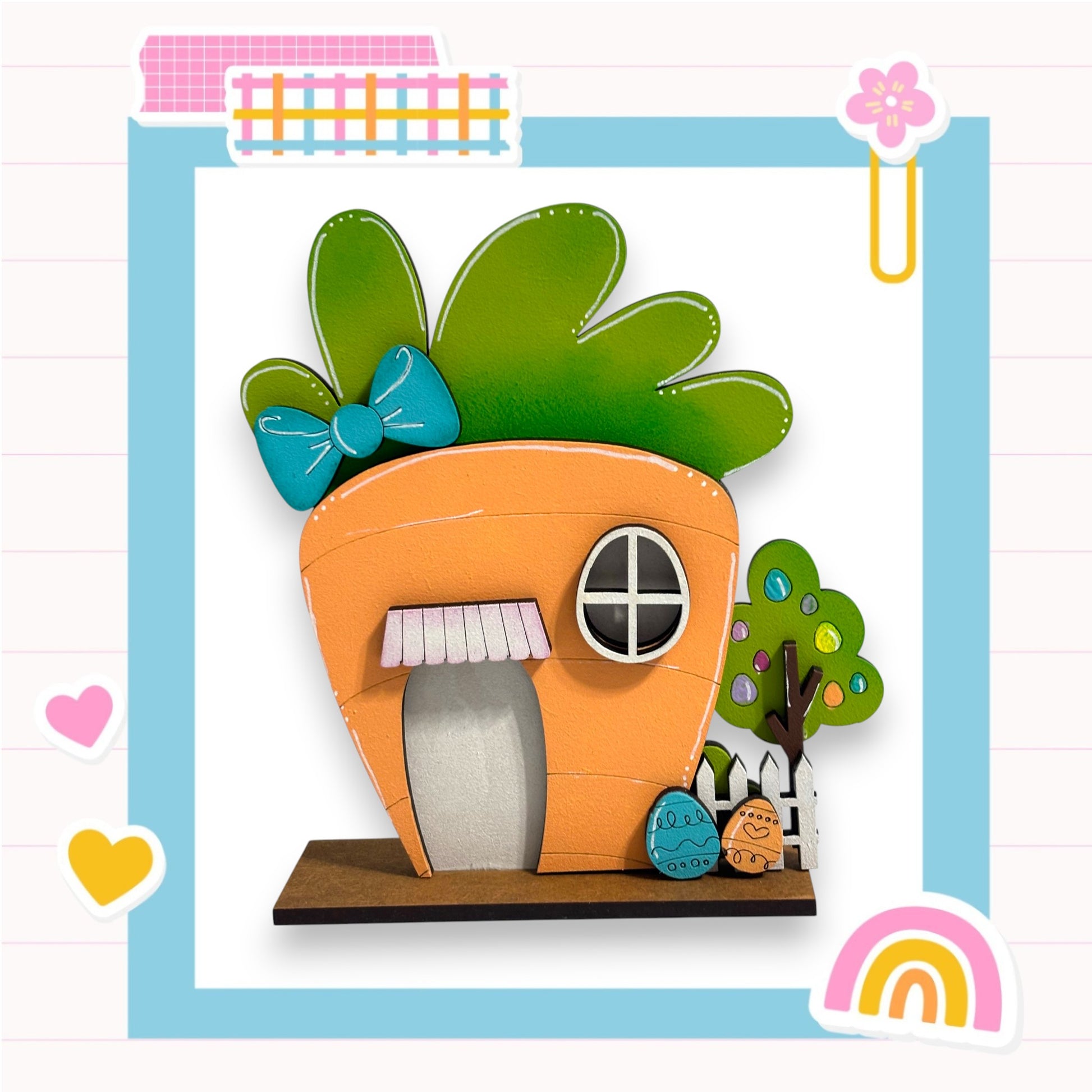 A whimsical, handcrafted wooden house in the shape of a carrot, adorned with a bow and surrounded by a tree and other decorative elements, set against a colorful background.