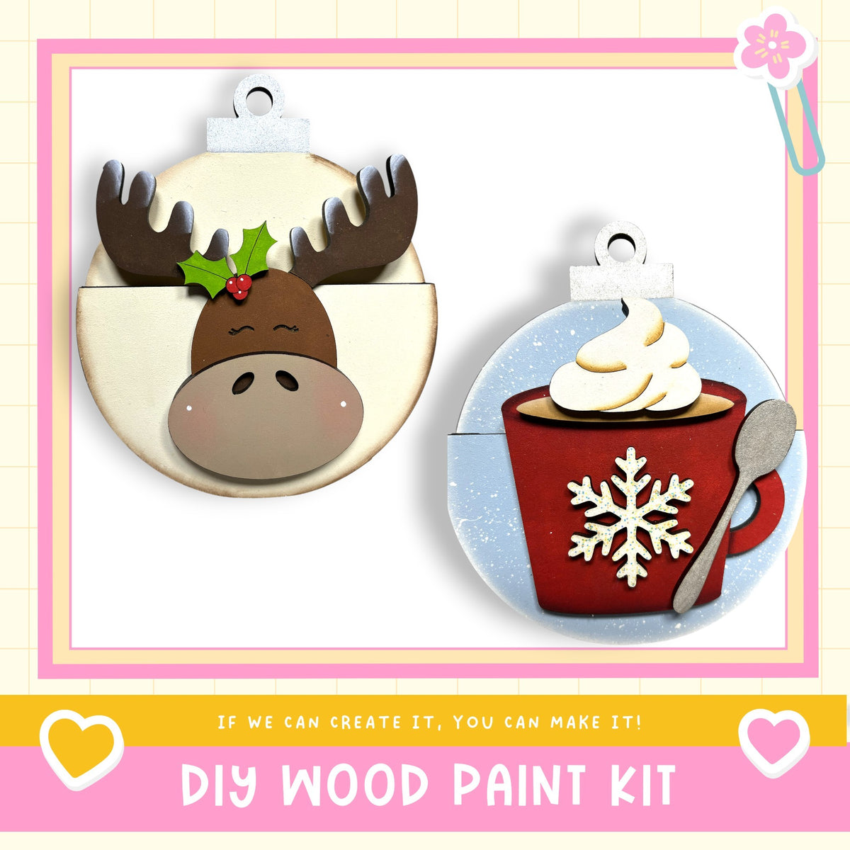 two wooden ornaments, one shaped like a moose head with a holly leaf and a red cup with a snowflake, and the other shaped like a red mug with a spoon. The text below the image reads "DIY WOOD PAINT KIT" and "IF WE CAN CREATE IT, YOU CAN MAKE IT!"