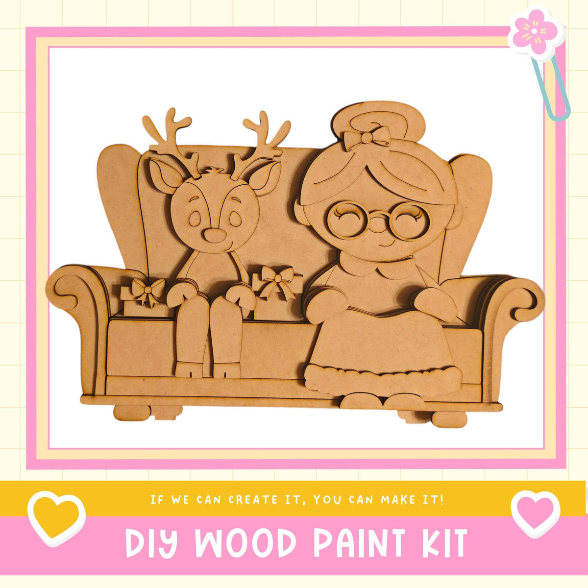 A DIY wood paint kit featuring a wooden reindeer and a wooden girl sitting on a wooden chair.