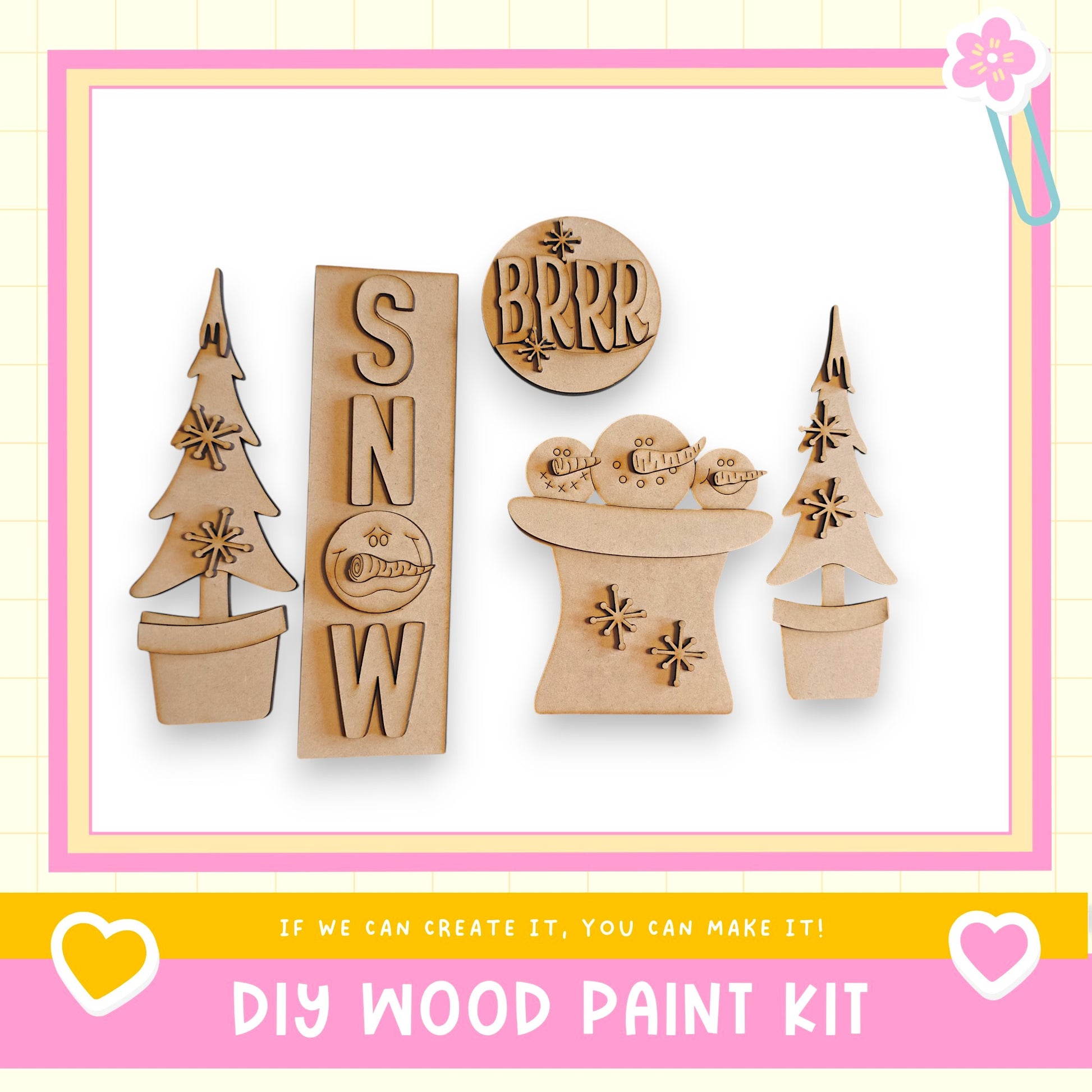 a DIY wood paint kit with various wooden shapes and decorations, including a snowman, a tree, and a snowflake.