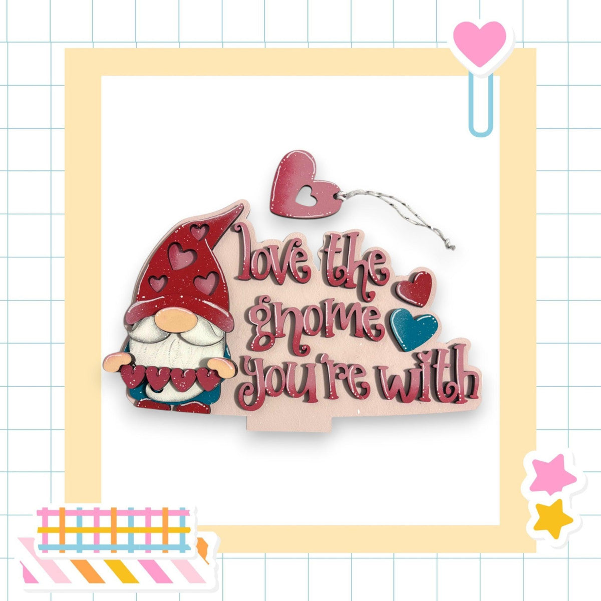 a card with a picture of a gnome holding a heart