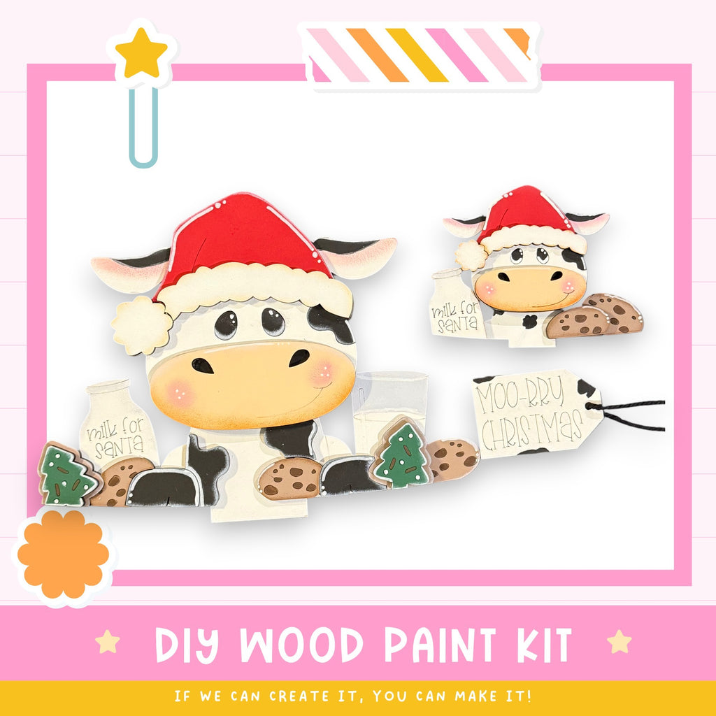 a DIY wood paint kit for creating a Christmas-themed cow decoration. The kit includes a cow-shaped cookie, a cookie-shaped tag, and a cookie-shaped tag. The cow is wearing a Santa hat and holding a cookie. The kit is designed to allow users to create their own Christmas-themed cow decorations.