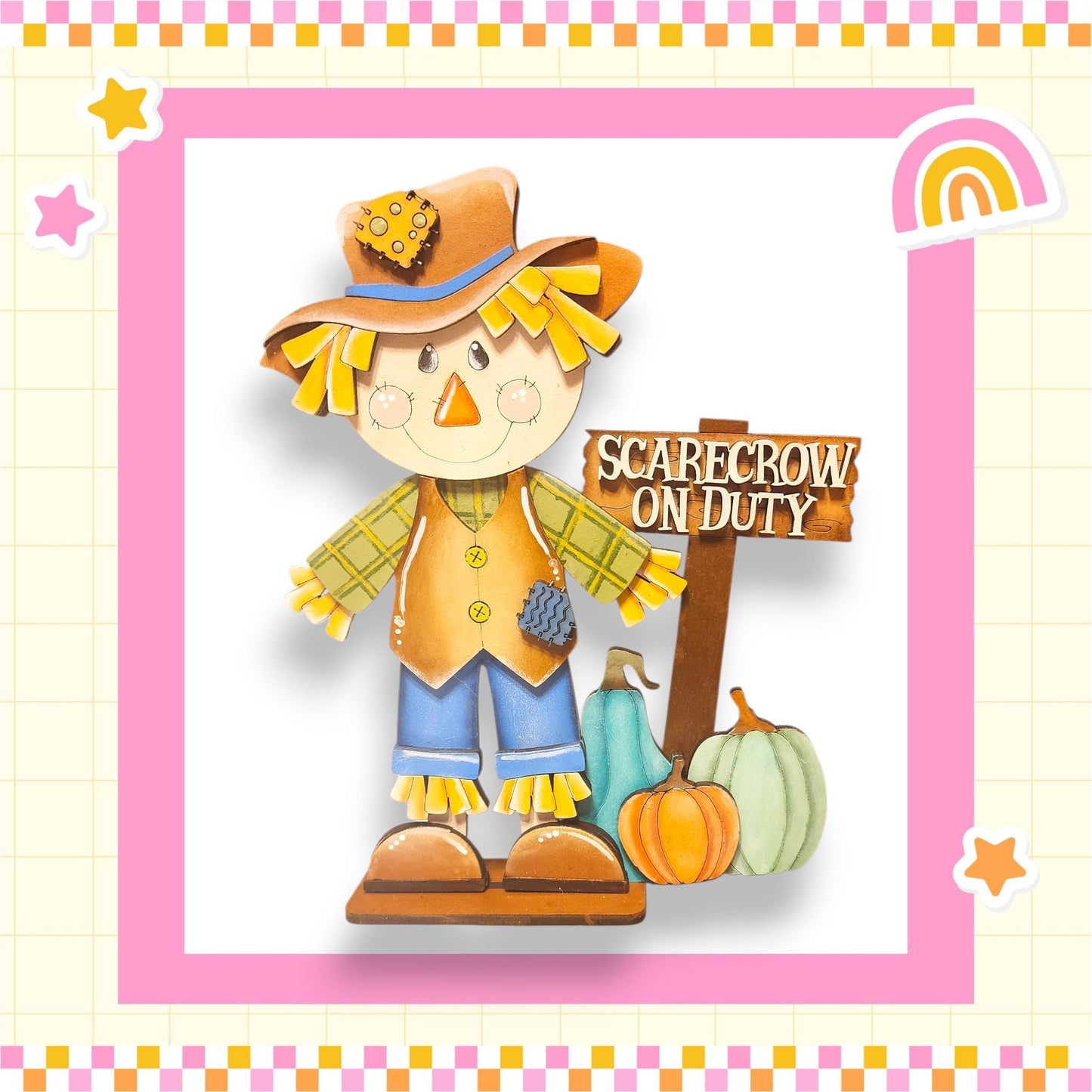 A cheerful scarecrow figure stands next to a sign that reads "Scarecrow on Duty", surrounded by pumpkins and a rainbow.