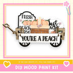 a picture of a wooden wagon with pumpkins on it