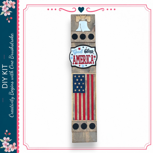 a wooden sign with an American flag design and the phrase "America" written on it.