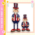 two wooden figures, one larger and one smaller, dressed in patriotic attire with red, white, and blue colors.