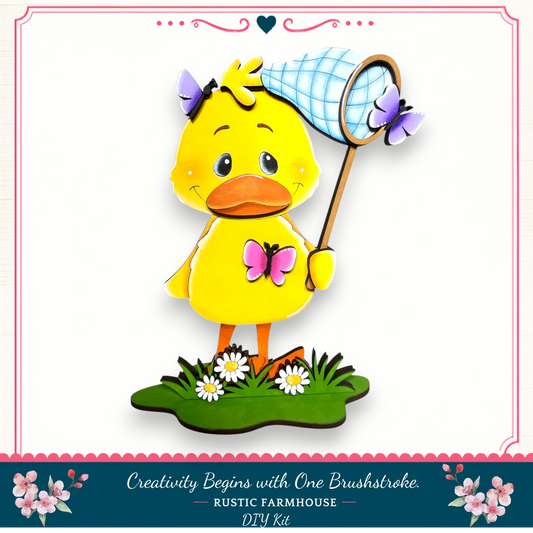 A yellow duck holding a blue and white butterfly net, standing on a grassy area with flowers, and surrounded by a decorative border.