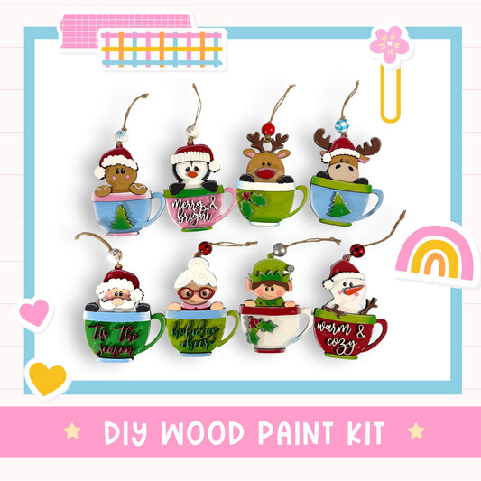 a group of christmas ornaments hanging from strings