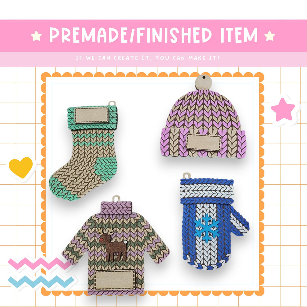four knitted mittens and gloves are shown on a card