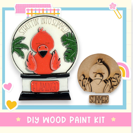 a DIY wood paint kit for creating a wooden bird-shaped ornament, with a red bird and tropical leaves as the main design elements.