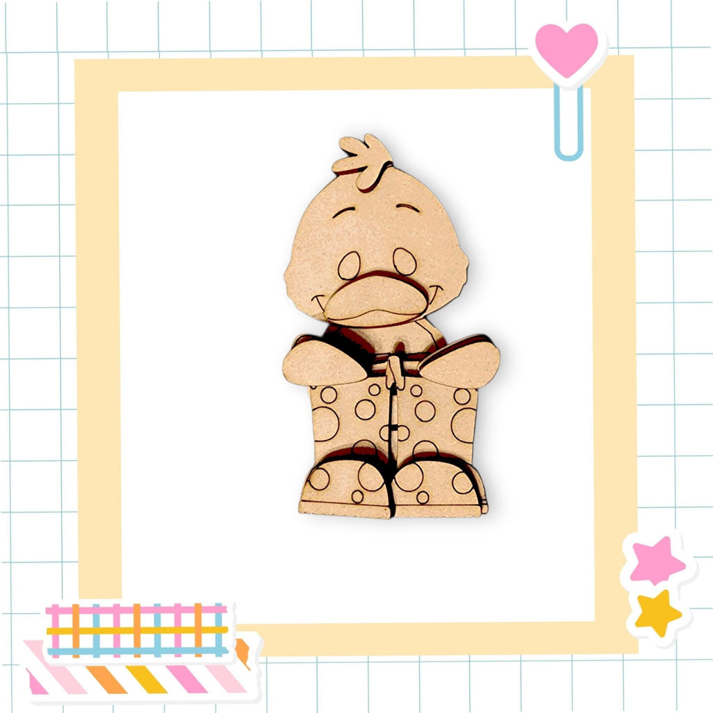 a wooden cutout of a teddy bear