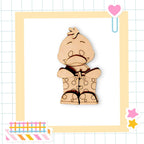 a wooden cutout of a teddy bear