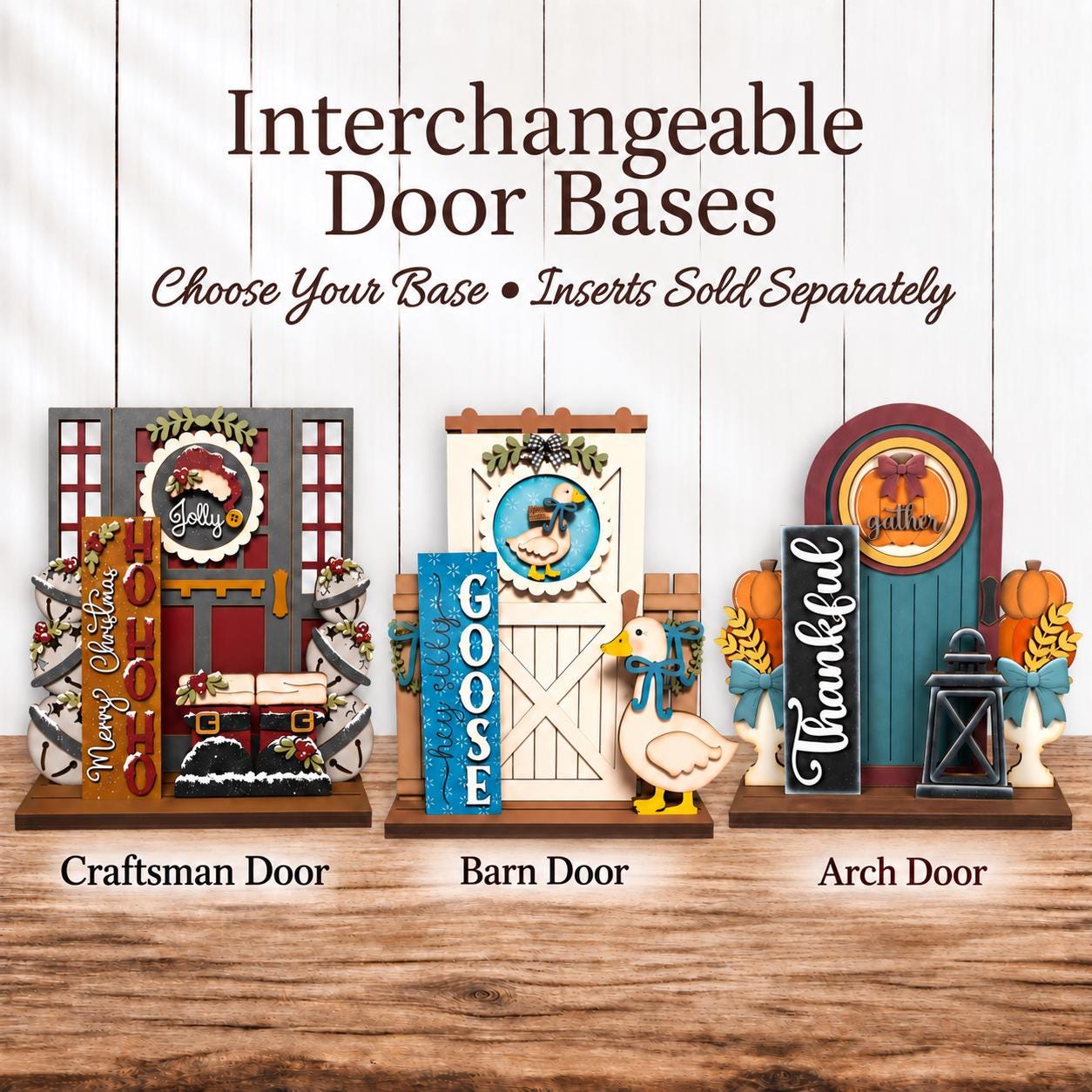 three decorative door bases, each with a unique design and color scheme, arranged on a wooden surface.