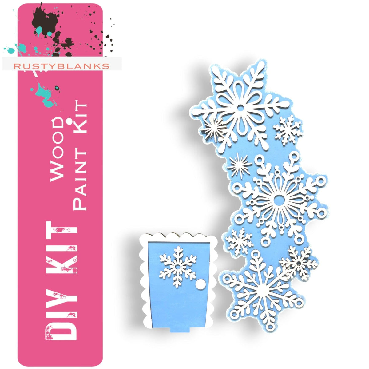 a snowflake cut out of paper next to a box
