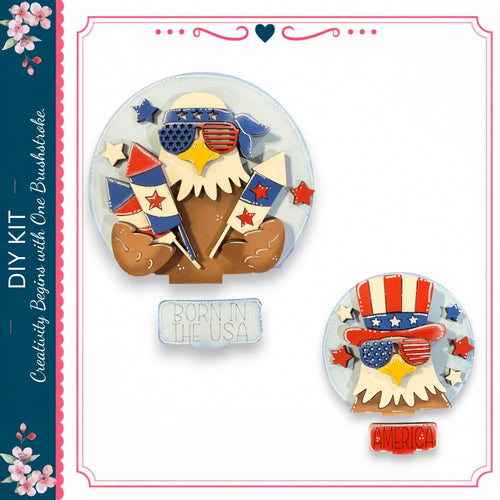 two patriotic-themed cookies, each with an eagle wearing sunglasses and holding a flag. The cookies are decorated with stars, stripes, and the word "America" written on them.