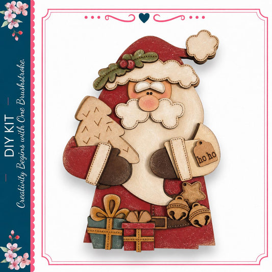 A wooden Santa Claus figure holding a Christmas tree and presents, with a "ho ho" tag attached to his hand.