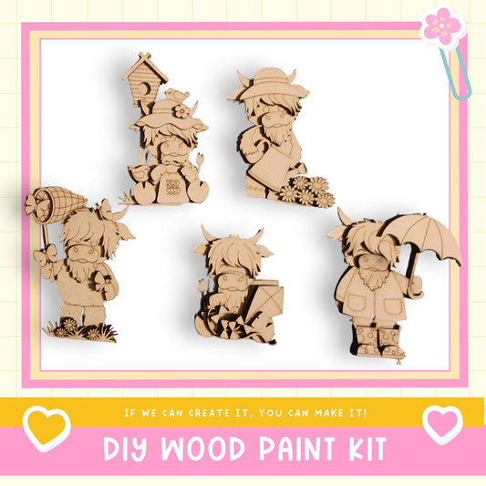 The image is a collage of five wooden figurines depicting various characters, including a bird, a boy, a girl, a boy with a bird, and a boy with an umbrella. The collage is framed by a pink border and includes text that reads "DIY WOOD PAINT KIT" and "If we can create it, you can make it!"