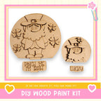 a DIY wood paint kit for creating a wooden character, specifically a leprechaun, with the text "Pinch Me I'm Irish Lucky" and "If we can create it, you can make it!"